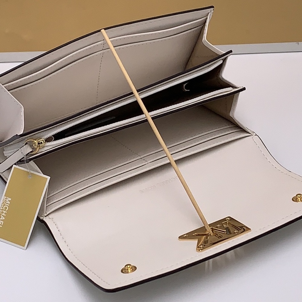 Brand New with Tag
Michael Kors Large Mimi Bifold Wallet
Color: Optic Wh… - Picture 11 of 16